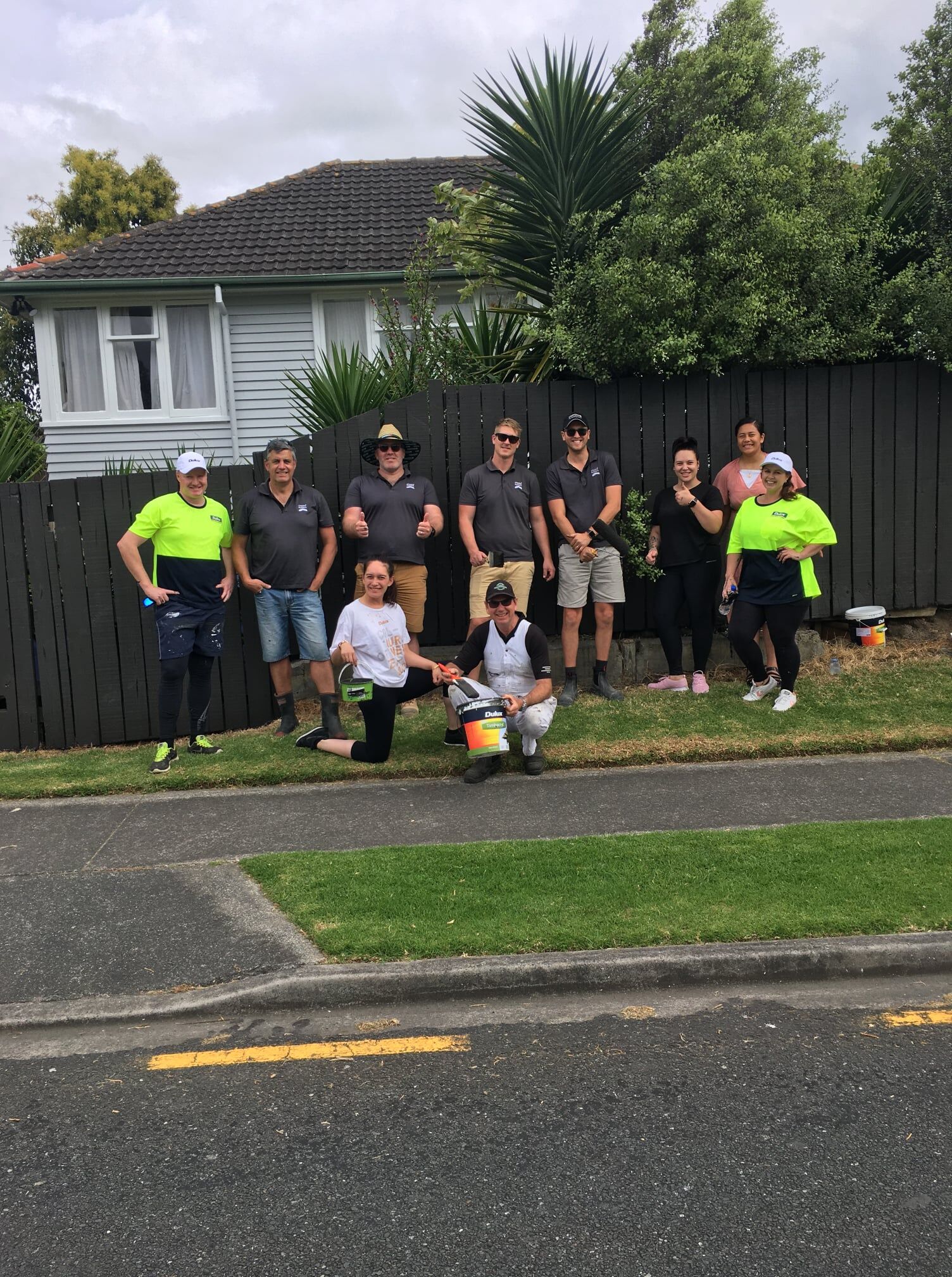 BOP Team painting fence 